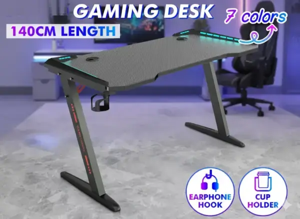 GT-02 RGB Gaming Table – 120×60cm Carbon Fiber Surface, Z-Shaped Metal Frame 74 cm Hight, RGB LED Lights, Cup Holder, Headset Hook, Dual Cable Ports, Steel Frame Stability, Customizable RGB Edge Lighting , Foldable & Compact